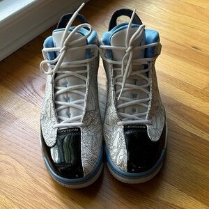 Jordan Men's White and Black Sneakers with Blue Accents